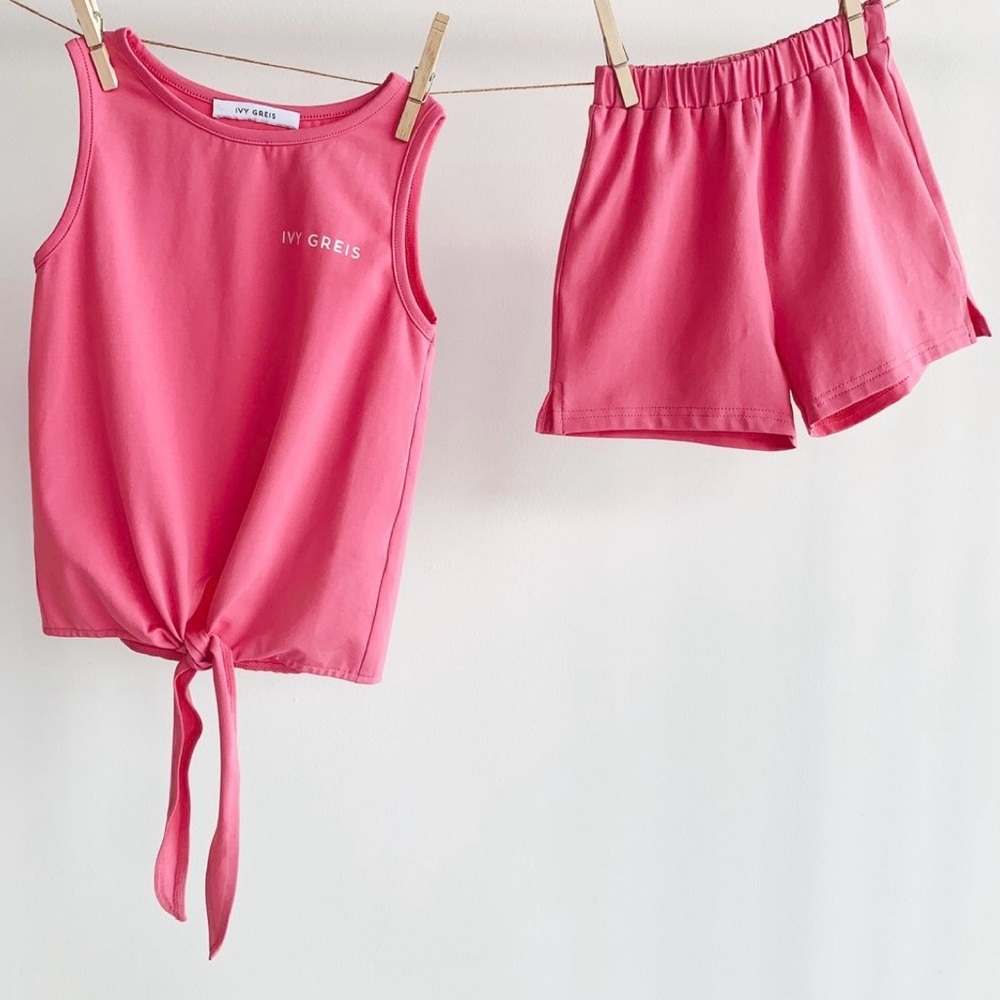 Girls pink top and shorts set in size 4T